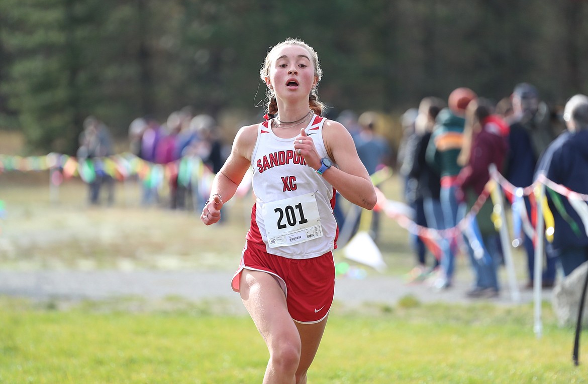 Grace Rookey crosses the finish line on Thursday.