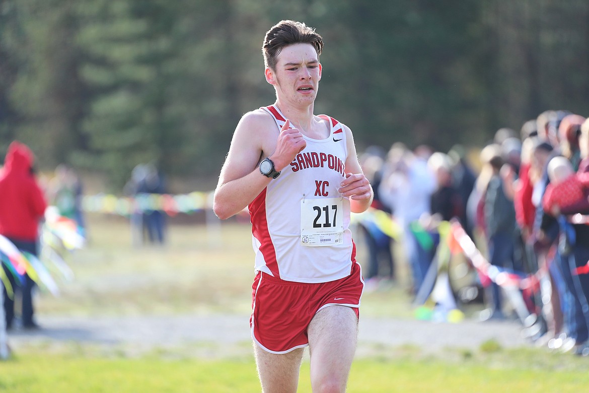 Michael Hall crosses the finish line on Thursday.