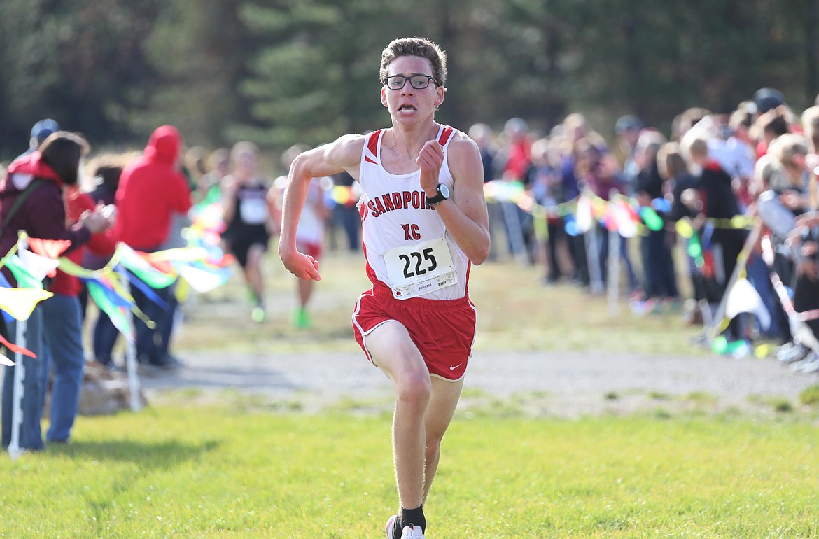Sophomore Nathan Roche digs deep as he nears the finish of the 4A Region 1 meet.