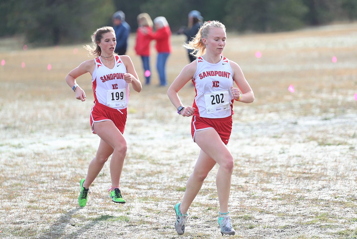 Mackenzie Suhy-Gregoire (right) gets off to a fast start during Thursday's regional meet.