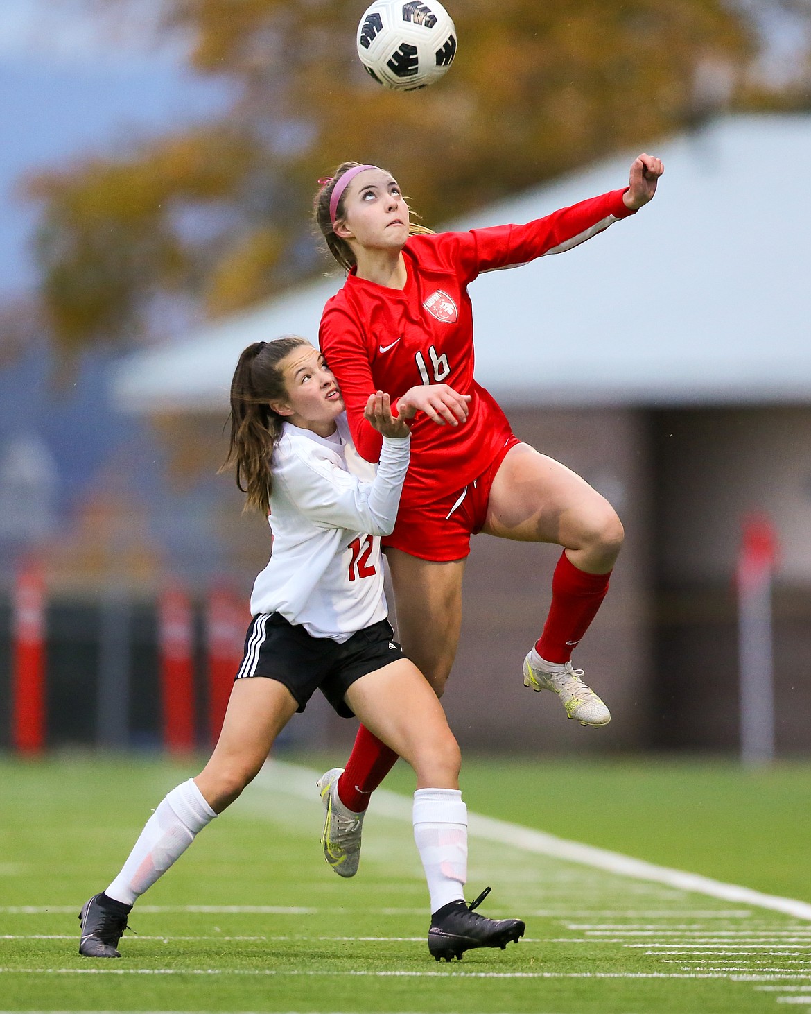 Kylie Williams rises up over a Moscow defender for a header during the 4A Region 1 title game on Oct. 14.