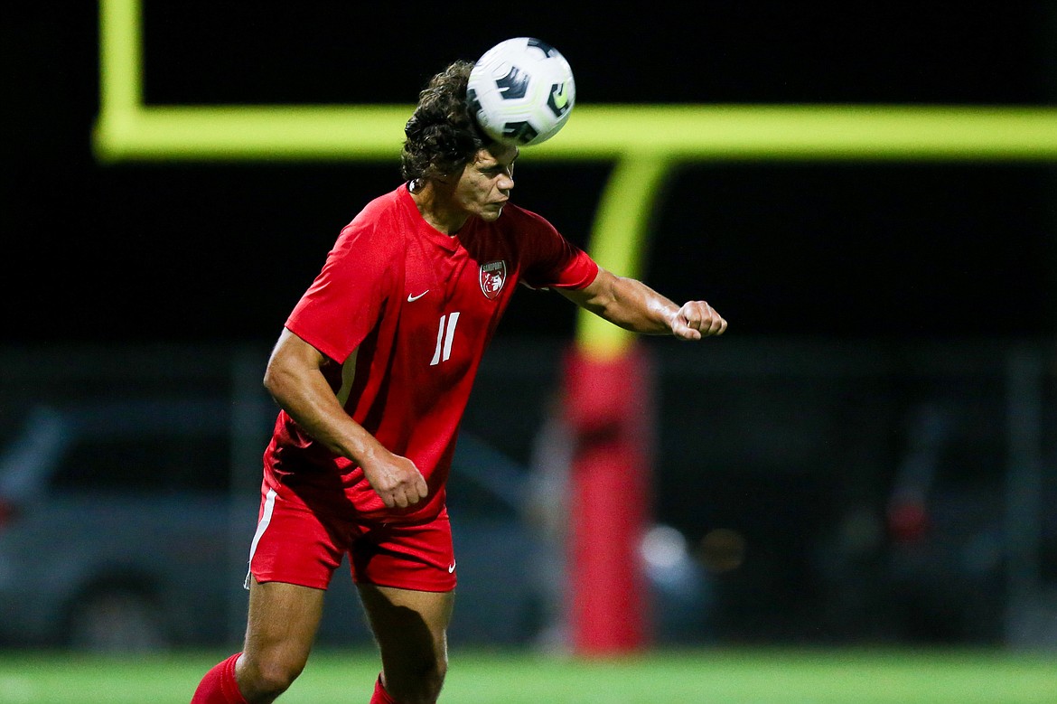 Stirling Roget heads the ball during the 4A Region 1 championship game on Oct. 14.