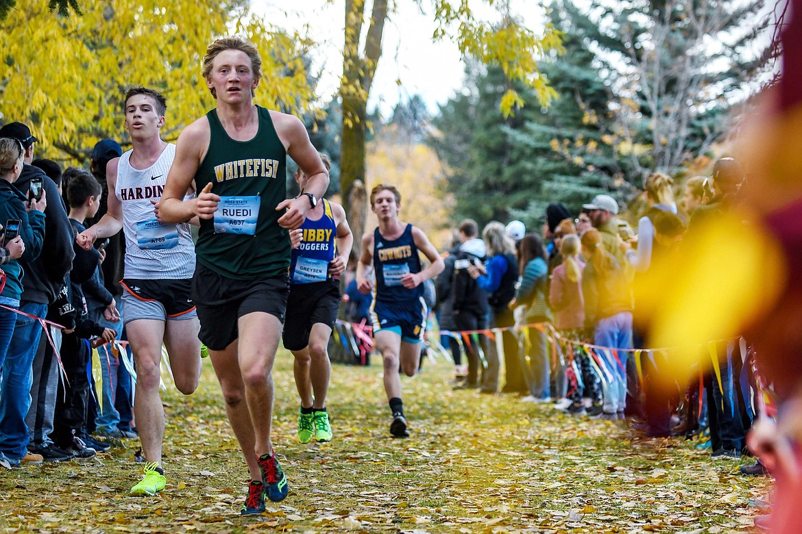 Whitefish’s Reudi Steiner runs at the state championship meet in Missoula on Oct. 23. (JP Edge/Hungry Horse News)