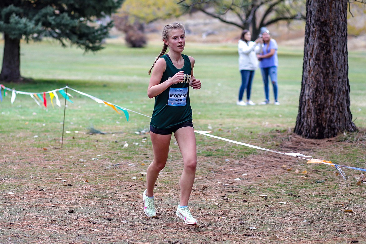 Whitefish’s Morgan Grube runs at the state championship meet in Missoula on Oct. 23. (JP Edge/Hungry Horse News)