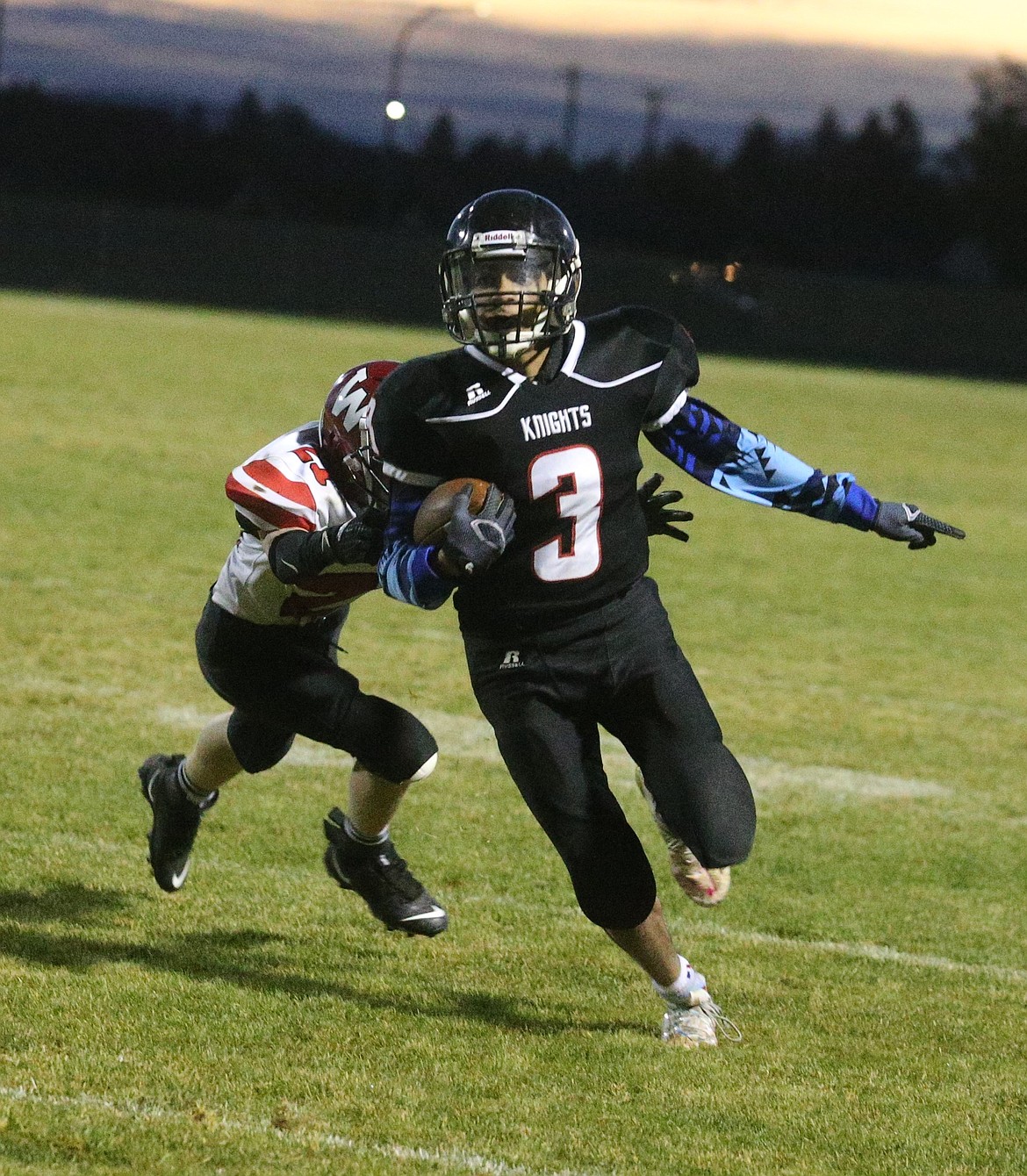 JASON ELLIOTT/Press
Lakeside wide receiver Vander Brown breaks up the field on a 25-yard touchdown pass during the Scenic Idaho Conference tiebreaker at Post Falls High.