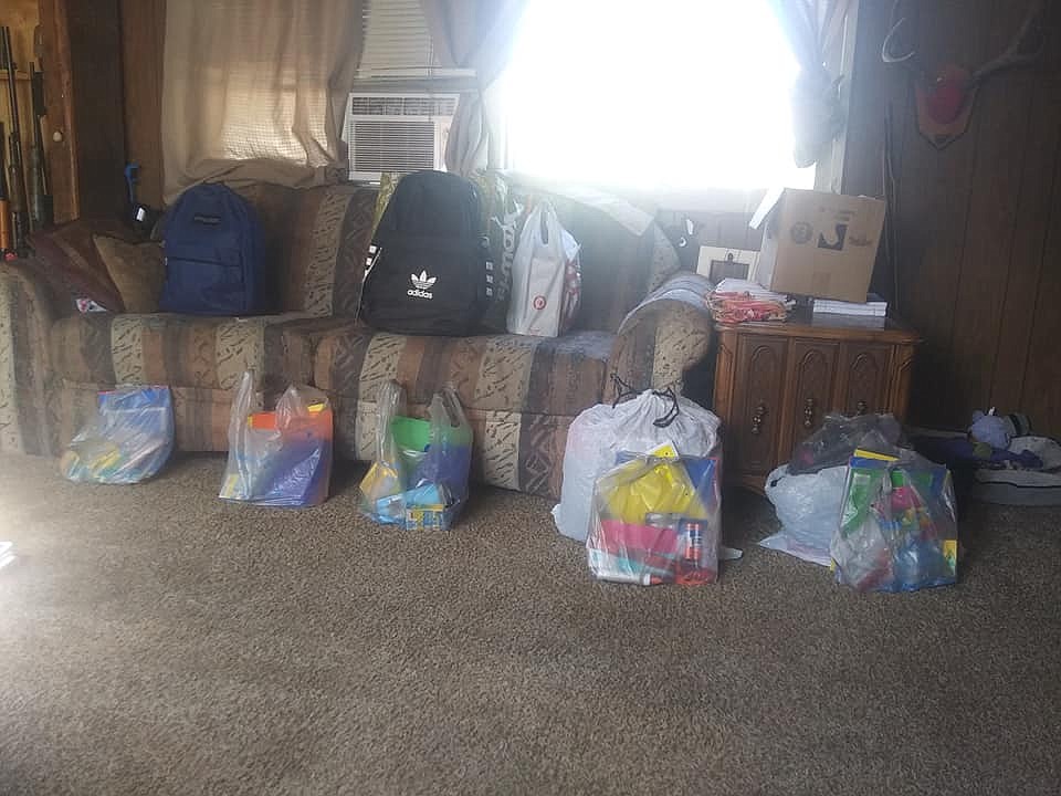 New backpacks, clothing, and back to school supplies were distributed earlier this year with the help of Amy Kelsey and her new group, Pathways to Help Mineral County. She aims to annually do this same giving each year for back to school time as well as providing area families with Christmas gifts and personal hygiene items. (Photo courtesy of Amy Kelsey)