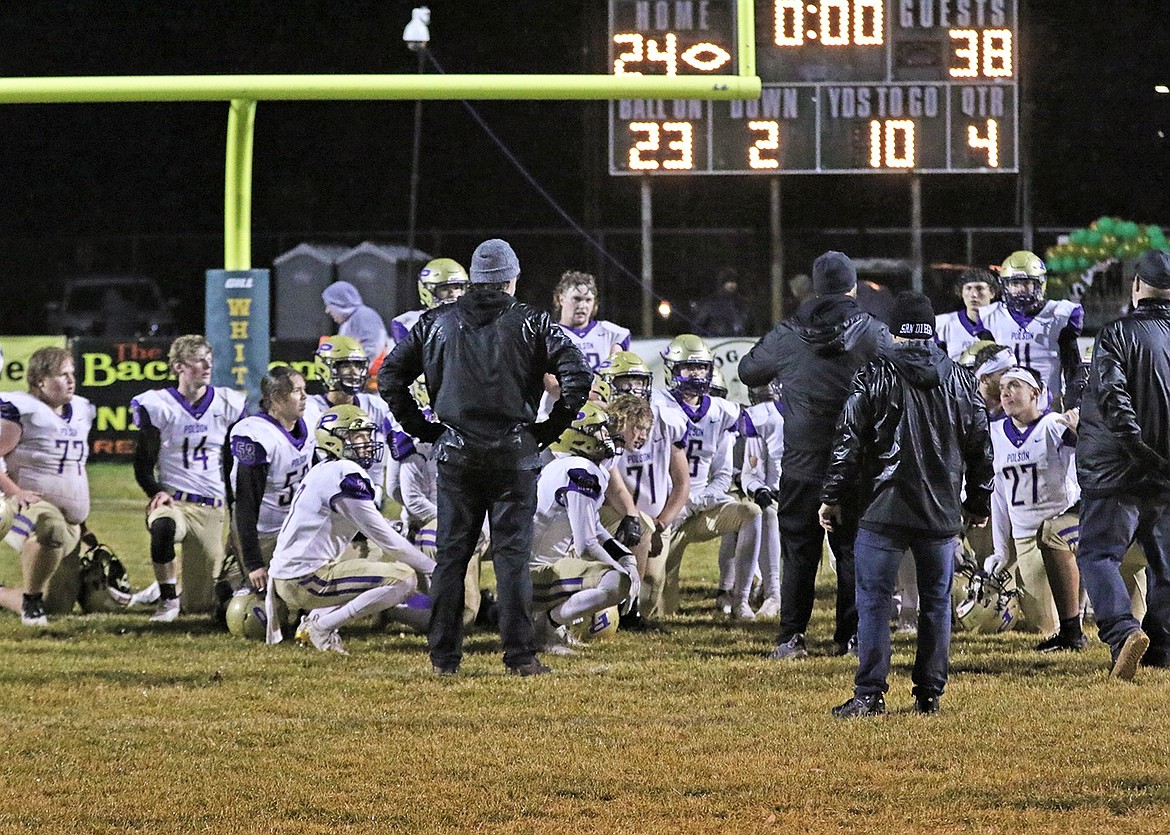 Polson coaches address their players after their win at Whitefish. (Courtesy of Bob Gunderson)