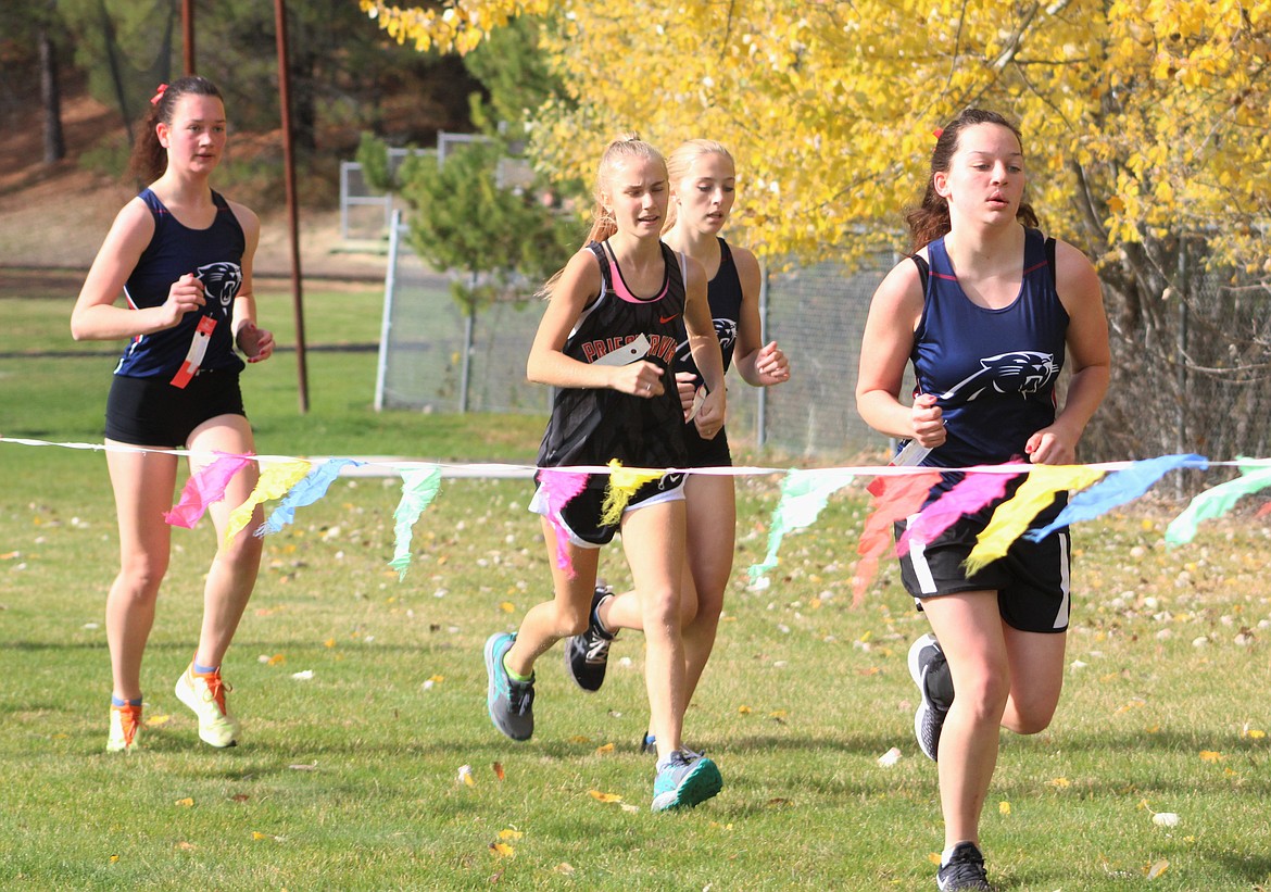 Junior Annie Morrell (center) competes in the 3A District 1-2 meet last Thursday.