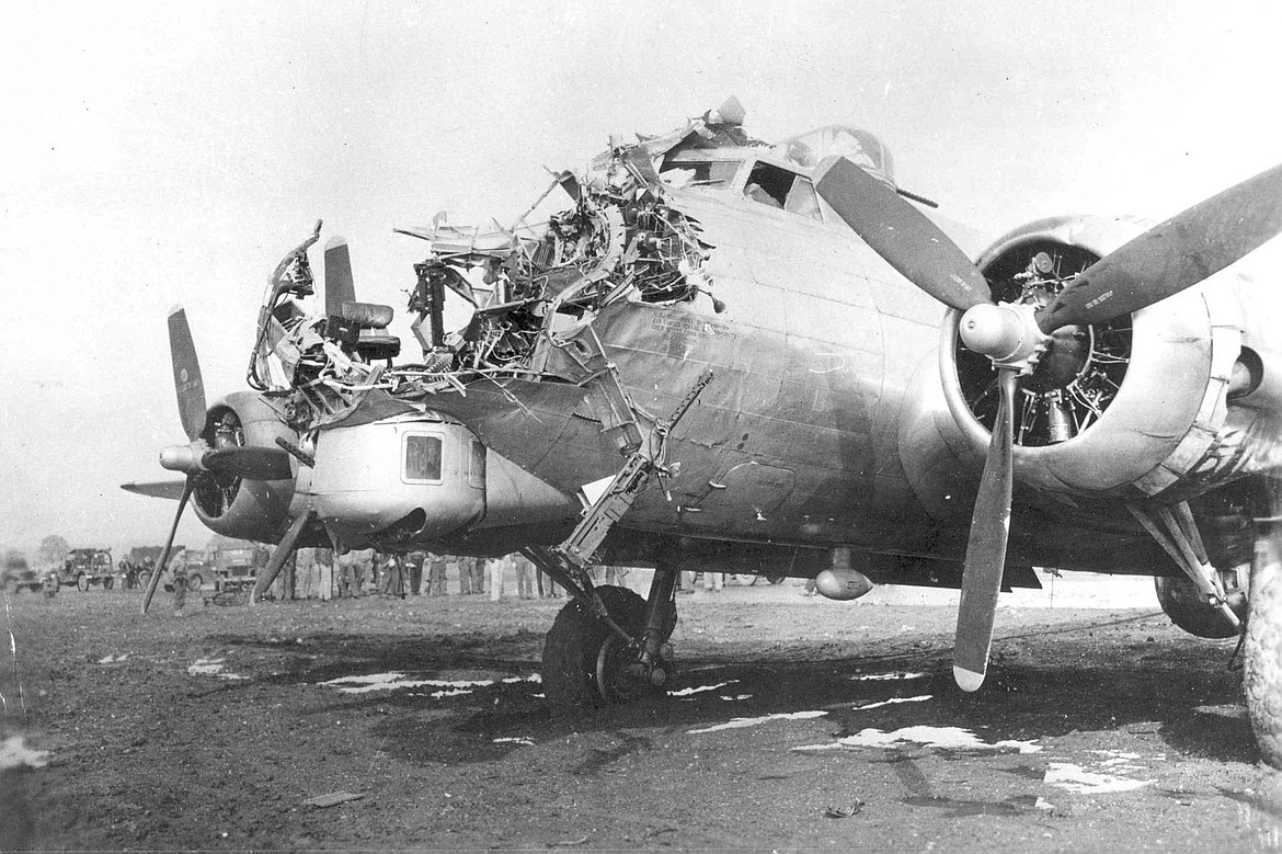 While on a bombing mission over Cologne, Germany, this 8th Air Force B-17 was hit in the bombardier nose compartment, killing him, but the plane made it back to home base in England (1944).