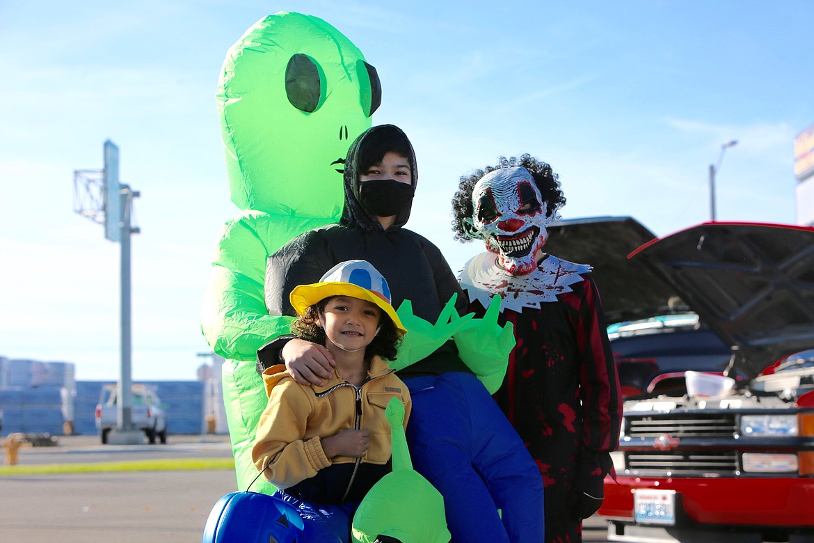 Ruiz brothers Isaac, in the little alien costume, Adrian, in the big alien costume, and Julian, in the nightmare clown costume, at the Bethel Assembly of God church in Othello last year for a Halloween trunk-or-treat.