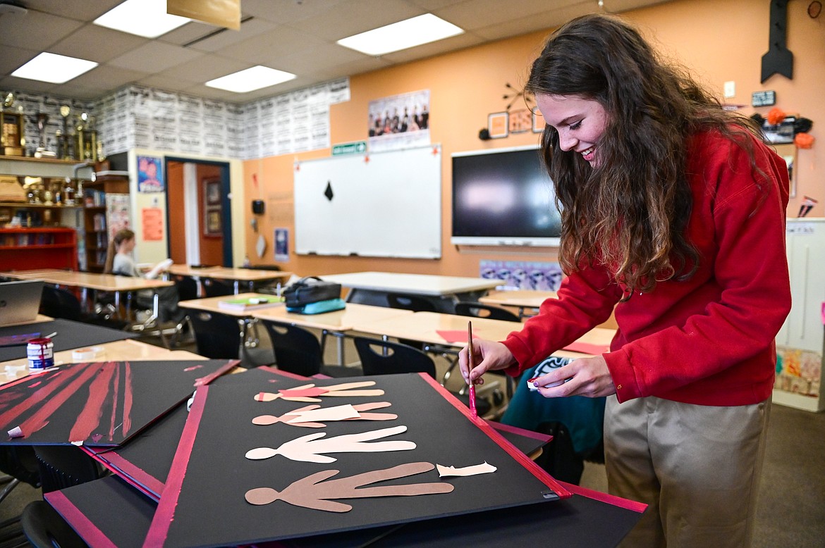 Neila Lyngholm works on posters for her informative speech at Flathead High School on Wednesday, Oct. 27. (Casey Kreider/Daily Inter Lake)