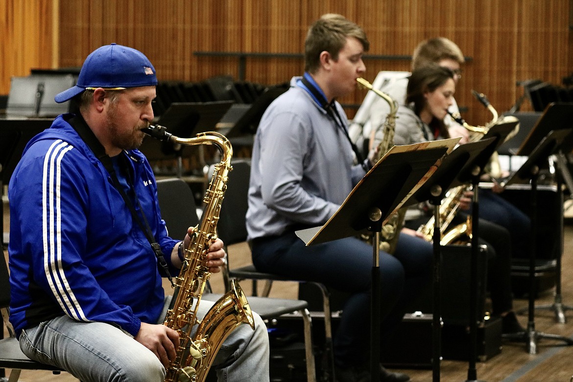 Seth Marshalek, far left, plays a tenor saxophone during practice Monday night with the NIC Jazz Ensemble. HANNAH NEFF/Press