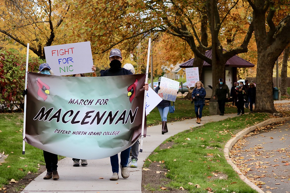 Around 130 North Idaho College affiliates and community members marched through campus on Wednesday prior to the board meeting to show their support for former college President Rick MacLennan who was fired by the Board of Trustees on Sept. 22. HANNAH NEFF/Press