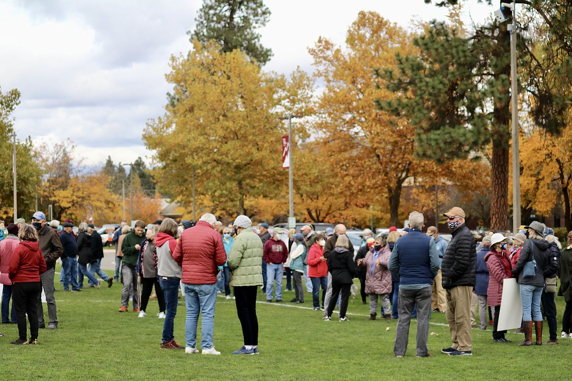 Around 130 people showed their support for former North Idaho College President Rick MacLennan at the march on Wednesday, prior to the Board of Trustees meeting. MacLennan was terminated without cause on Sept. 22. HANNAH NEFF/Press