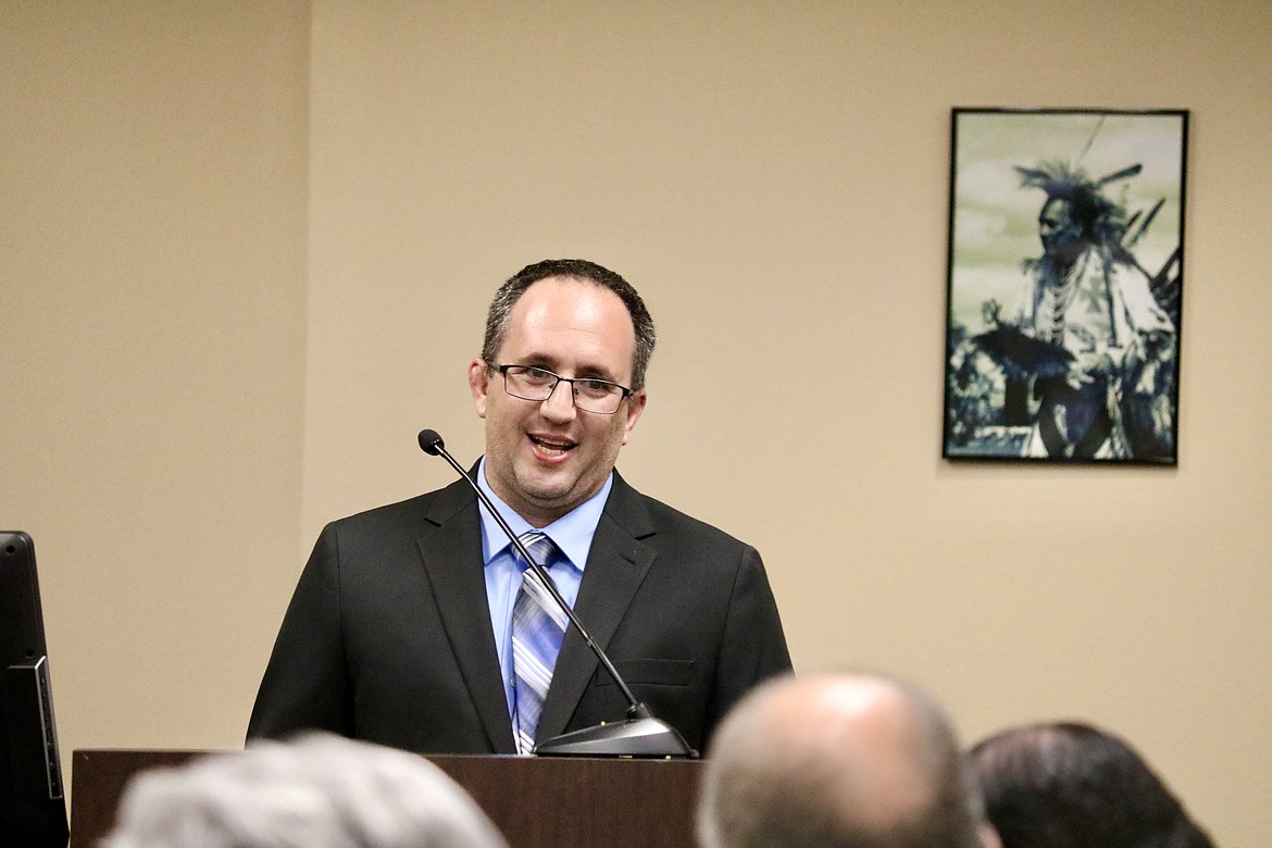 North Idaho College head wrestling coach Michael Sebaaly addresses the Board of Trustees at the board meeting Wednesday night in Student Union Building on NIC's main campus, following the vote to select him at interim president Monday night. HANNAH NEFF/Press