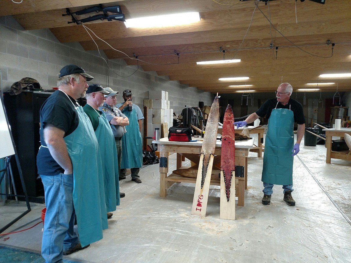 Photo courtesy IDFG Jake Powell
Men listen during a fur school program.