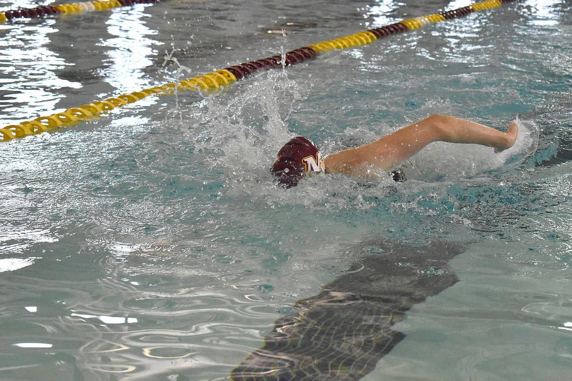 Moses Lake High School senior Laurel Knox competes in the swim and dive district preliminary races at the Tony St. Onge Pool of Dreams on Thursday. Here, she is swimming in heat three of the 200-yard freestyle event.