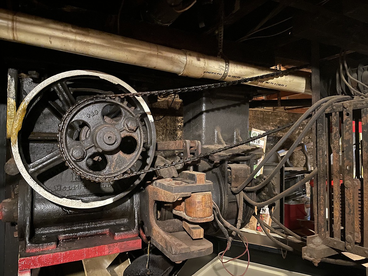 The ancient elevator motor and controls that live in the basement of the Metals Bar.