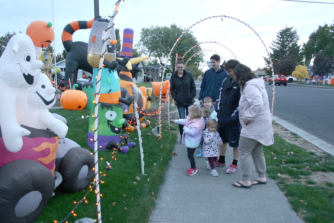 The Brown and Morris families were also among the visitors looking at the Halloween displays at the home of Cheryl and Alan Coulter, 2069 Crestmont Drive in Moses Lake. 
Elaborate Halloween and Christmas displays are a tradition at the Coulter house. 
“We come every year,” said Cassie Brown.