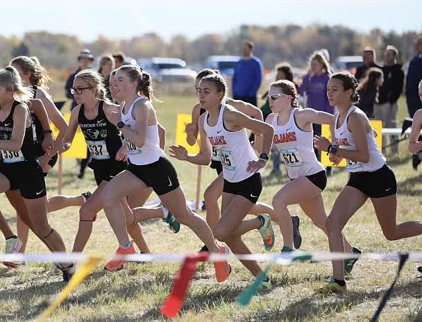 RICHARD WOOD/Special to The Press
Post Falls senior Sammie Wood, far left, Annastasia Peters, center, freshman Kaylynn Misner, and senior Alahna Lien, far right, get off the starting line during the state 5A girls cross country race at Eagle Island State Park on Friday.