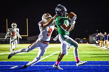 Glacier tight end Luke Bilau (4) holds on to a touchdown reception in the first quarter against Billings Senior at Legends Stadium on Friday, Oct. 29. (Casey Kreider/Daily Inter Lake)