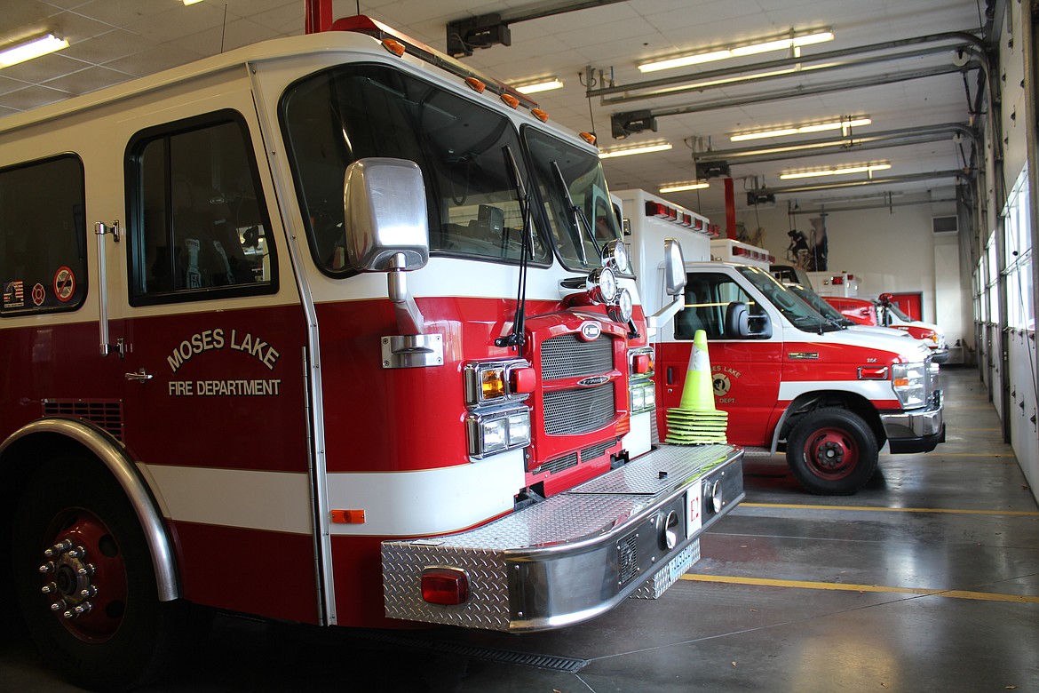 Trucks sit in the bay at the Moses Lake Fire Department.