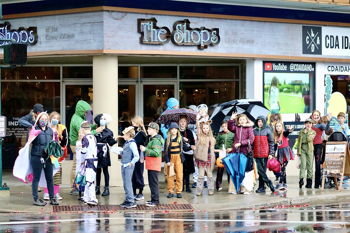 All 315 kids from Sorenson Magnet School of the Arts and Humanities  in Coeur d'Alene marched up and down Sherman Avenue with their teachers and parents for a costume parade and downtown trick or treating. Business owners supplied the candy. HANNAH NEFF/Press