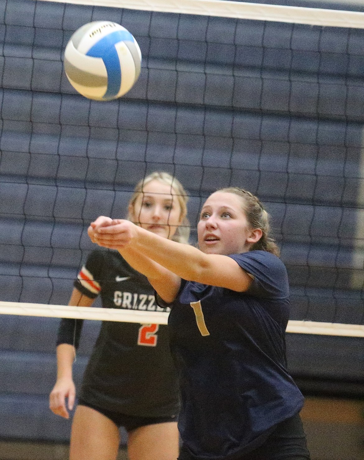 JASON ELLIOTT/Press
Timberlake senior setter Sami Wilfong attempts to pass to a teammate during the third set of Friday's state 3A volleyball opening round match against Fruitland at Lake City High.