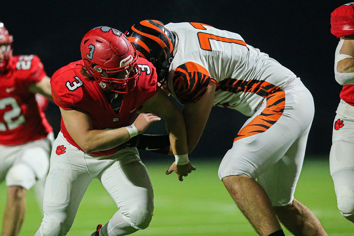 Senior Blake Sherrill breaks through the Mountain Home offensive line in 2021.