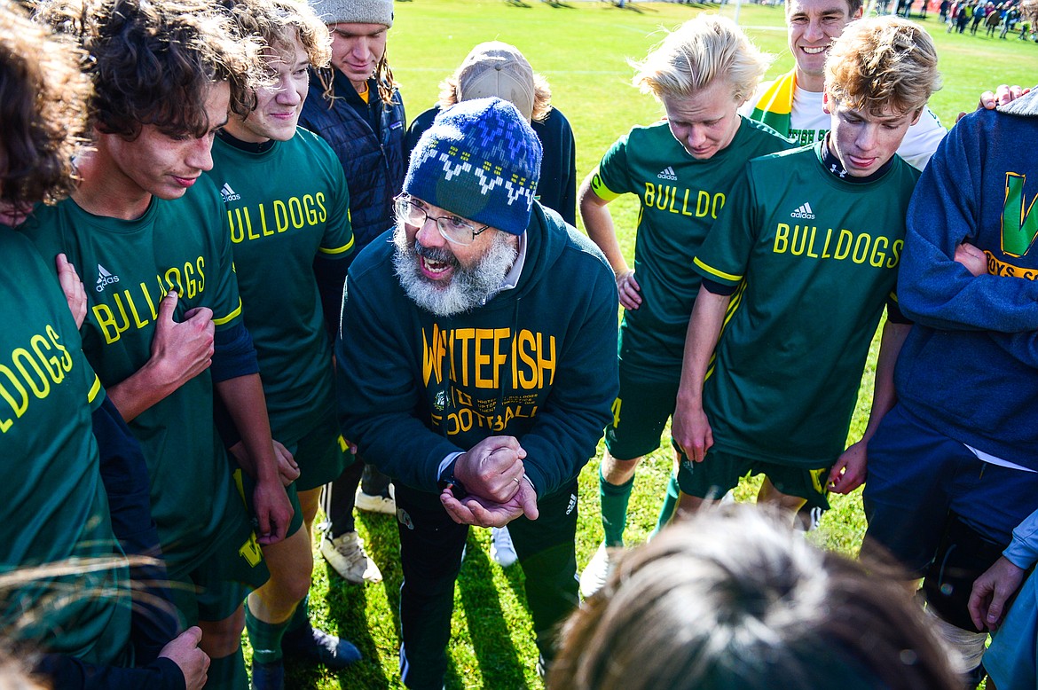 Whitefish head coach John Lacey talks with his team after their 3-2 win over Columbia Falls in the State A championship at Smith Fields on Saturday, Oct. 30. (Casey Kreider/Daily Inter Lake)