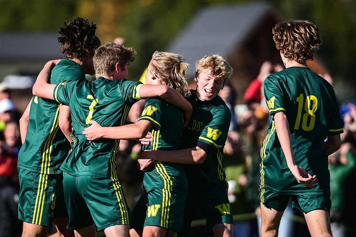 Whitefish celebrates after Chase Sabin's (3) goal in the second half of the State A championship against Columbia Falls at Smith Fields on Saturday, Oct. 30. (Casey Kreider/Daily Inter Lake)
