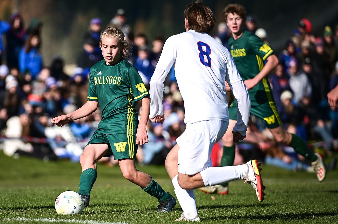 Whitefish's Chase Sabin (3) looks to pass in the second half of the State A championship against Columbia Falls at Smith Fields on Saturday, Oct. 30. (Casey Kreider/Daily Inter Lake)