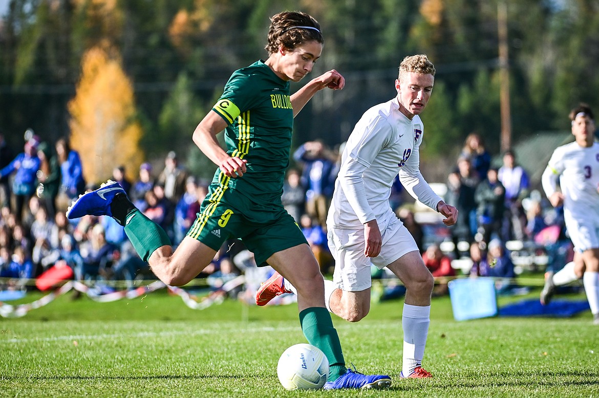 Whitefish's Gabe Menicke (9) scores a goal in the first half of the State A championship against Columbia Falls at Smith Fields on Saturday, Oct. 30. (Casey Kreider/Daily Inter Lake)