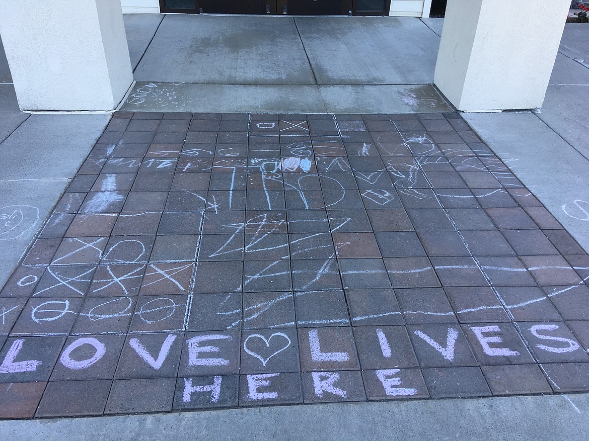 Sidewalk art by young Family Promise clients outside of Calvary Lutheran Church in Post Falls.