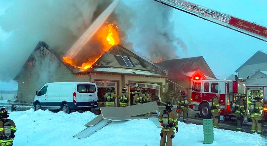 Kootenai County Fire and Rescue respond to the Rinker family house fire on December 27, 2020.