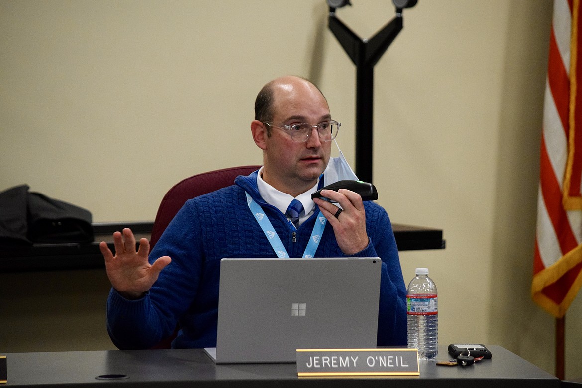 Moses Lake School District Chief Operations Officer Jeremy O’Neil explains how the district processes public records requests during a meeting Thursday.