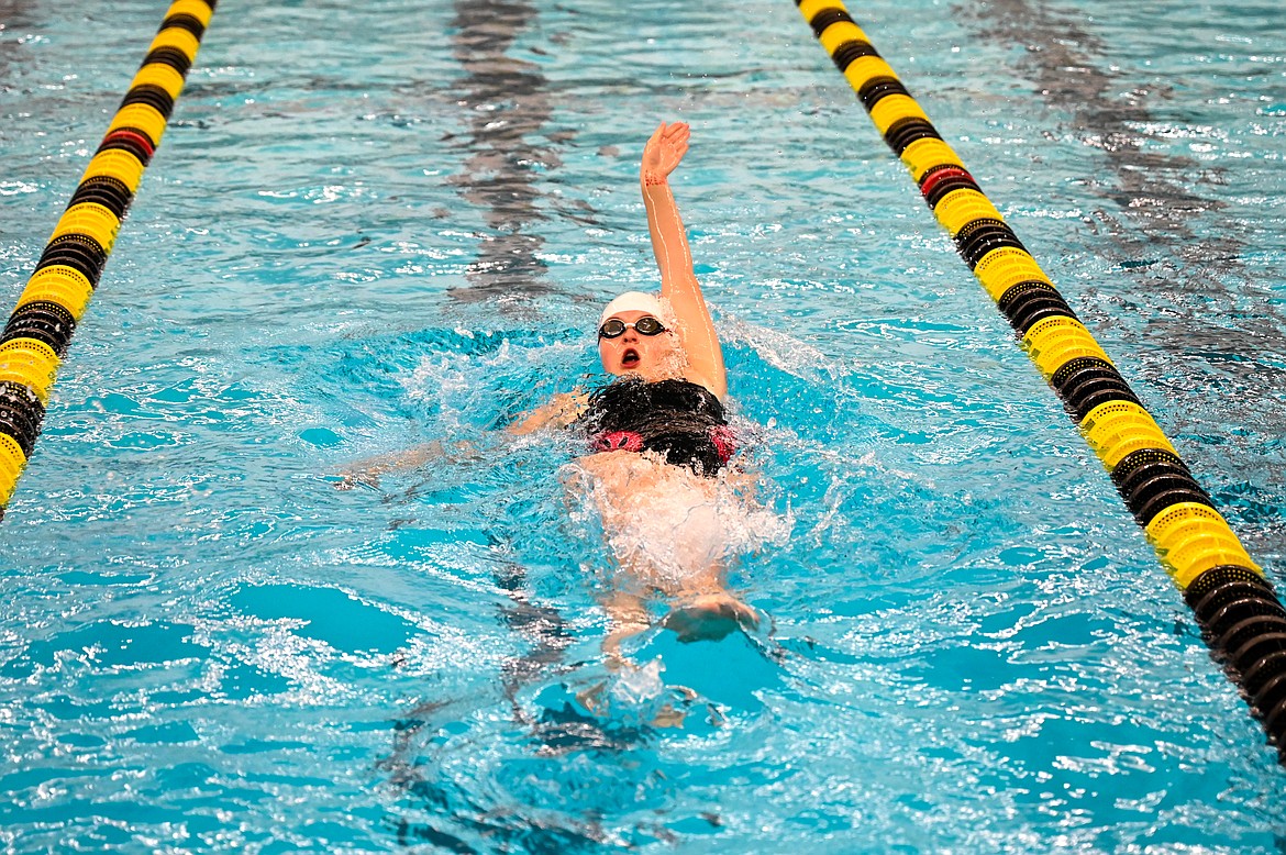 McKinley Jensen swims backstroke on Saturday.