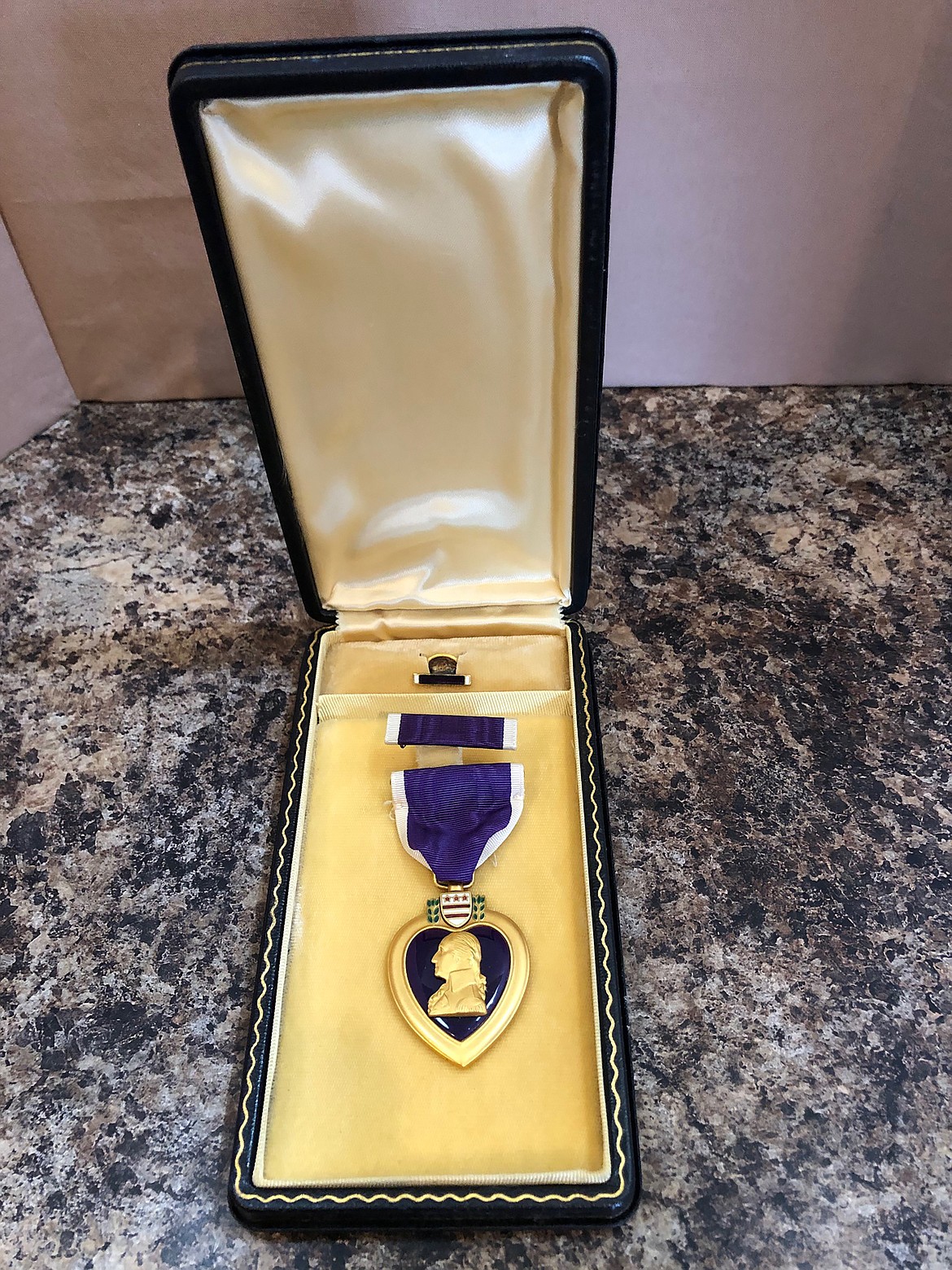 A closeup of one of Ronald Williams' two Purple Hearts.