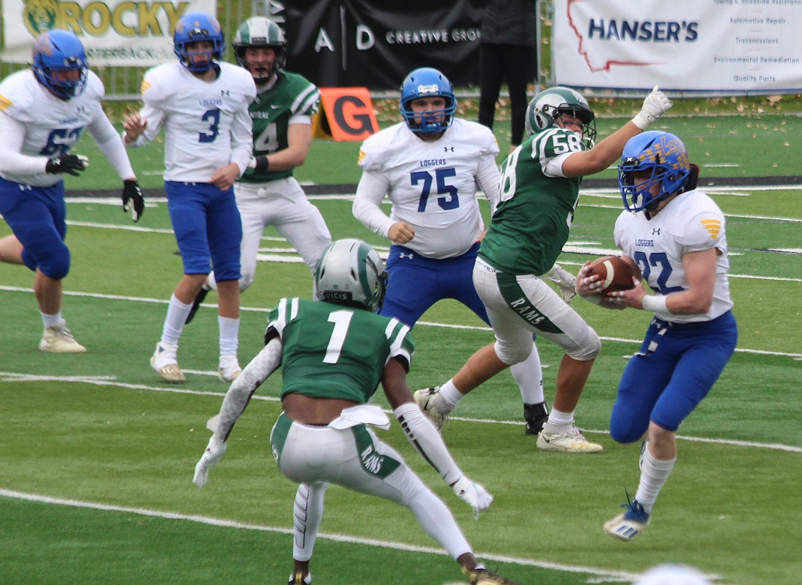 Ryan Collins carries the ball during an Oct. 30 playoff game against Billings Central. (Photo courtesy of Paula Collins)