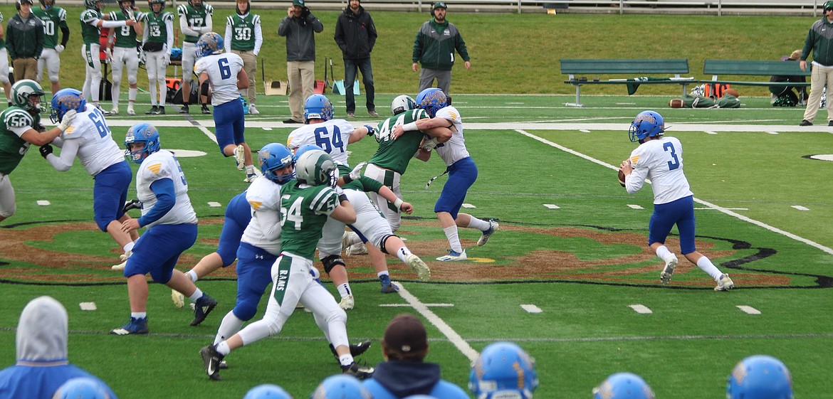 Trevor Collins looks for the pass on Oct. 30 against Billings Central. (Photo courtesy of Paula Collins)