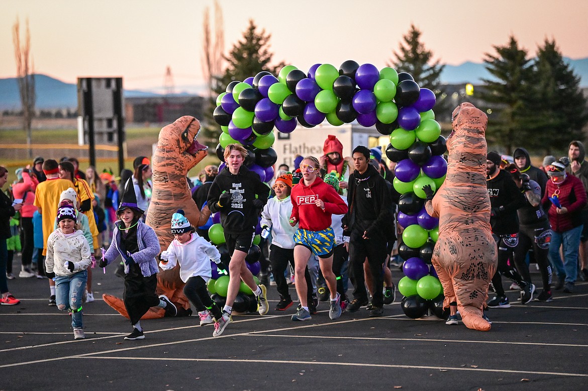 Participants start the Glow Run at Kidsports Complex on Saturday, Oct. 30. (Casey Kreider/Daily Inter Lake)