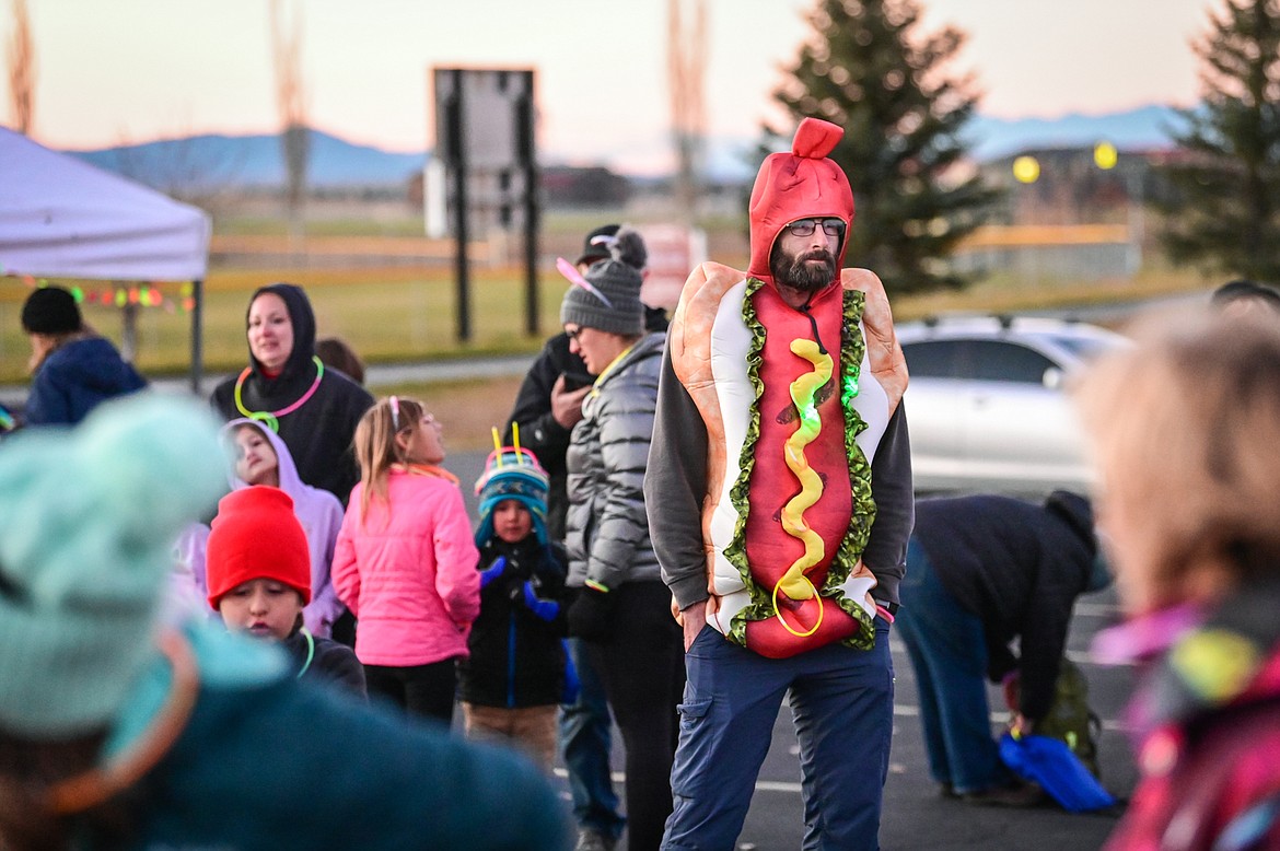 Participants wait for the start of the Glow Run at Kidsports Complex on Saturday, Oct. 30. (Casey Kreider/Daily Inter Lake)