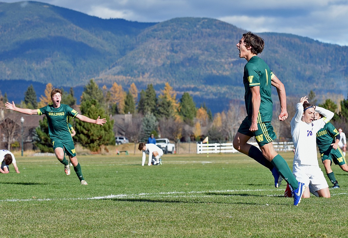 Bulldog Gabe Menicke celebrates his game-winning goal against Columbia Falls during Whitefish's fourth-straight State A Championship on Saturday in Whitefish. (Whitney England/Whitefish Pilot)