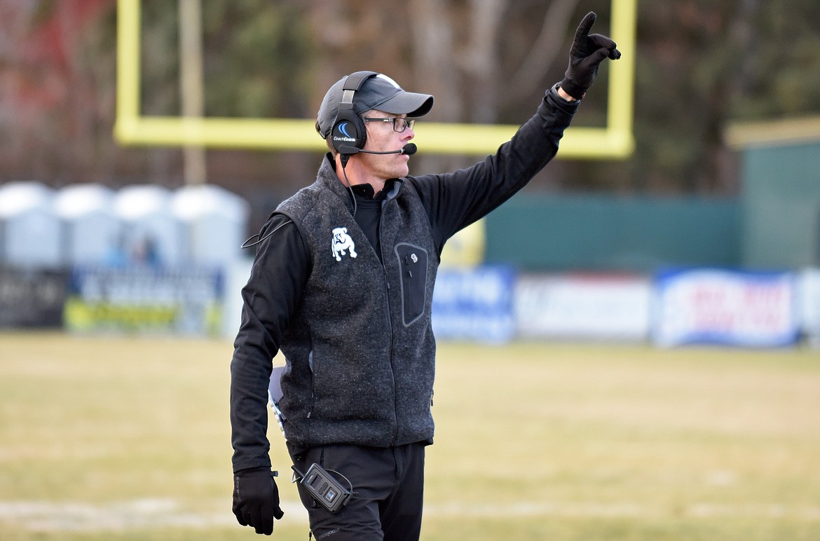 Whitefish head coach Chad Ross shouts to his players on the field during a playoff game against Frenchtown on Saturday in Whitefish. (Whitney England/Whitefish Pilot)