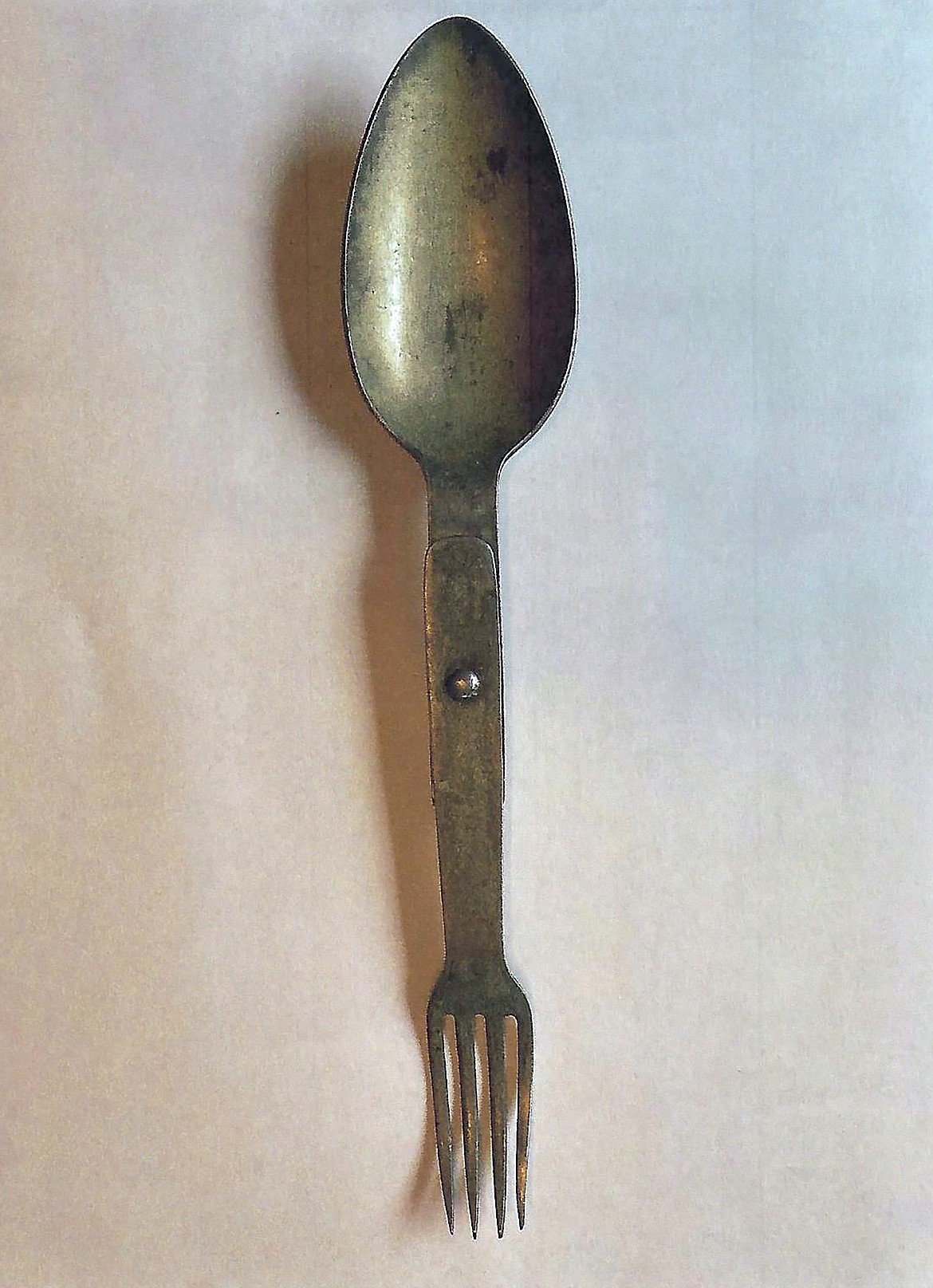 A memento of Harry F. Clark's time in the Argonne Offensive. From the mess kit of a fallen German soldier, the item is spoon-fork hinged combination, and is now over 100 years old.