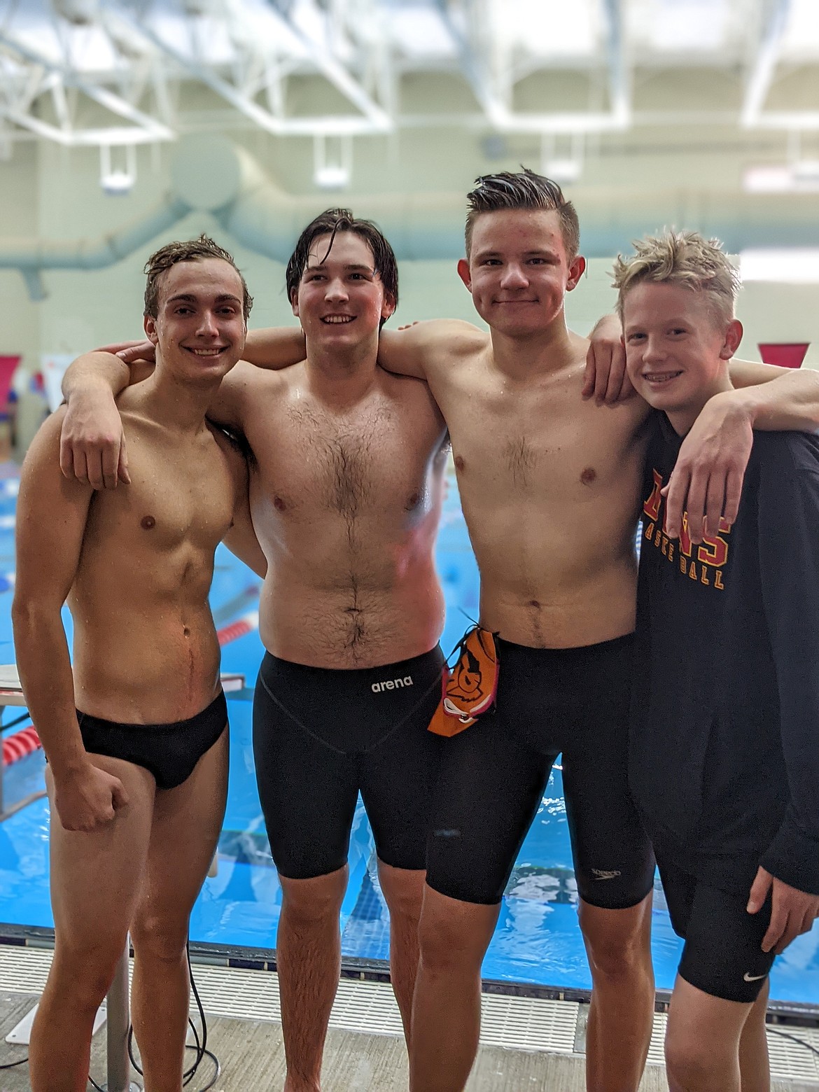 Courtesy photo
Post Falls High broke school records in the 200-yard individual medley relay and the 200 freestyle relay at the 5A North Idaho district swim meet on Saturday at the Kroc Center in Coeur d'Alene. From left are seniors Dylan Rieben, Charles Daniel “CD” Sharples and Ryder Koch; and junior Jonas Malone, who swam on both relays. State is this Friday and Saturday in Boise.