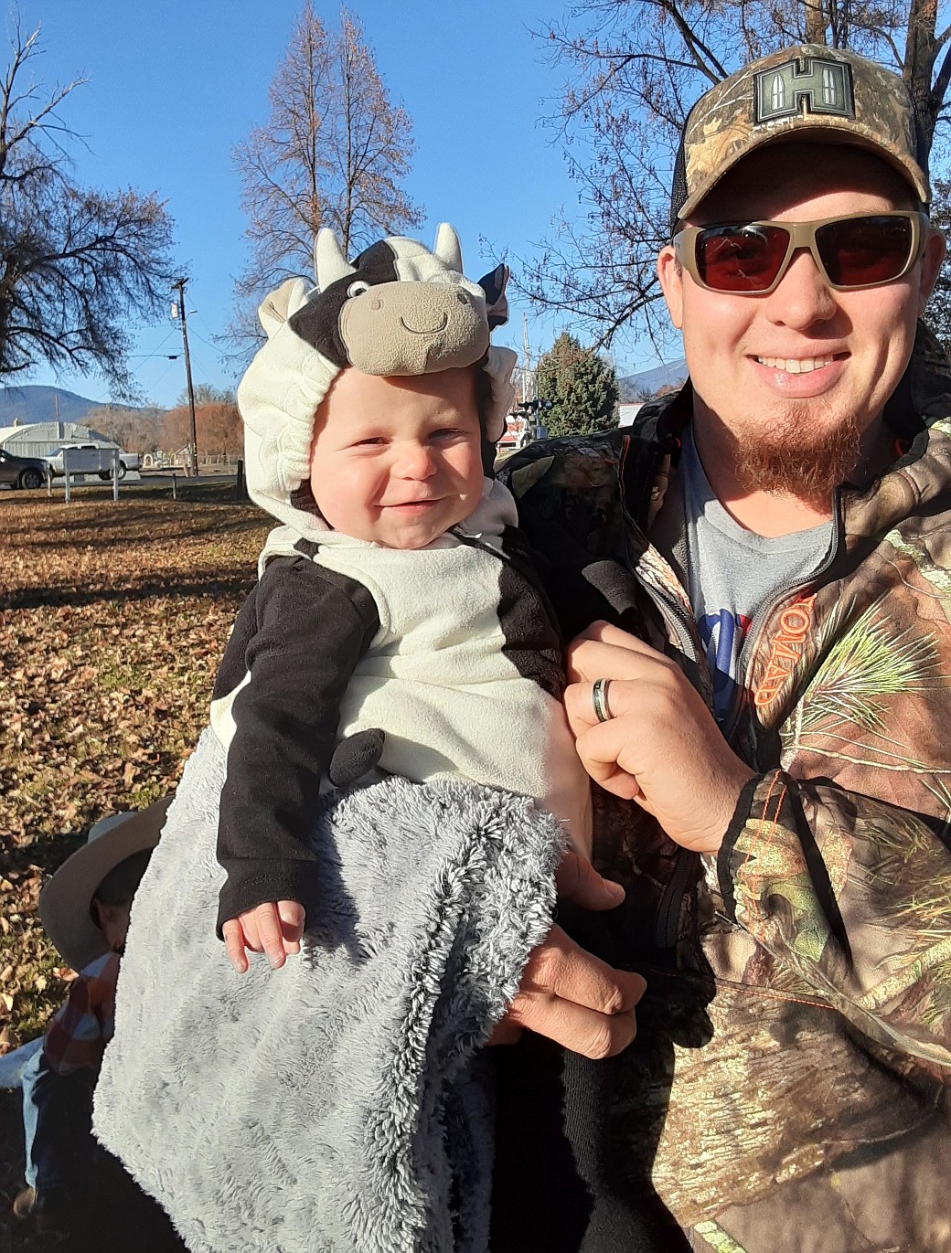 Daxton and his dad Dakota head out for trick or treats.