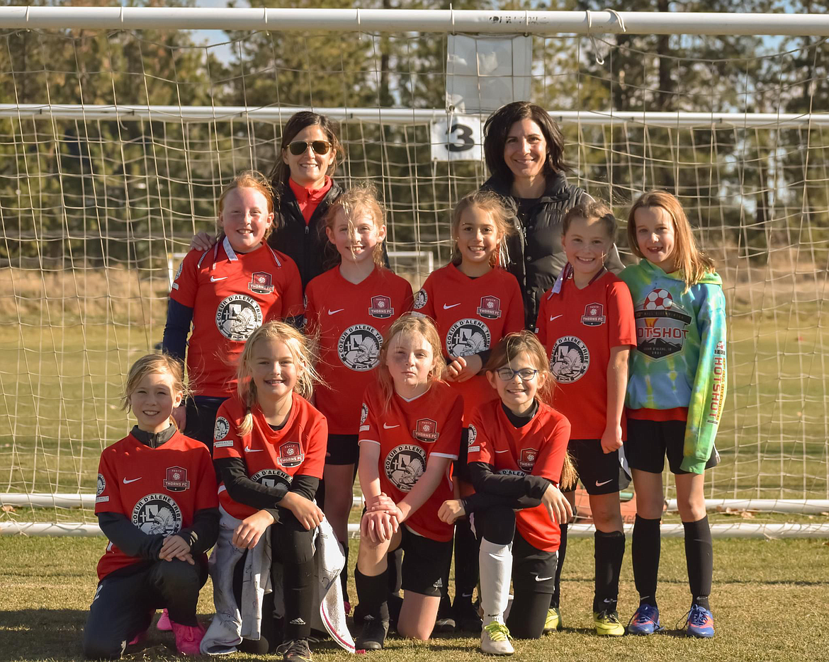Photo by MARY ELIZABETH CRAGO
The Thorns North FC 2012 Yellow girls soccer team finished its fall season this past weekend. In the front row from left are Adelyn Horsley, Fallyn Crago, Sara Fischer and Delaney Morrisroe; second row from left, Mary Kate Doree, Ariana Leferink, Chloe Quinn, Quinn Martin and Autumn Evans; and back row from left, coaches Katie Martin, left, and Tarragh Carr.