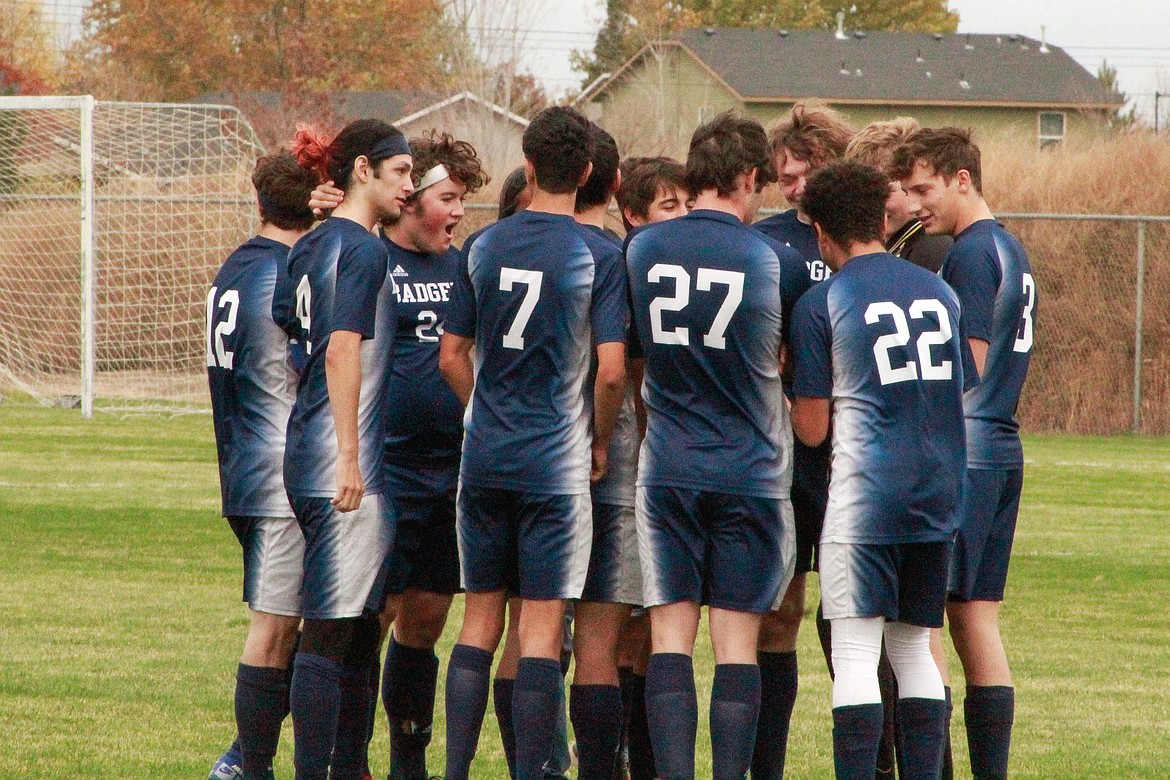 Badgers huddle up during the state tournament.