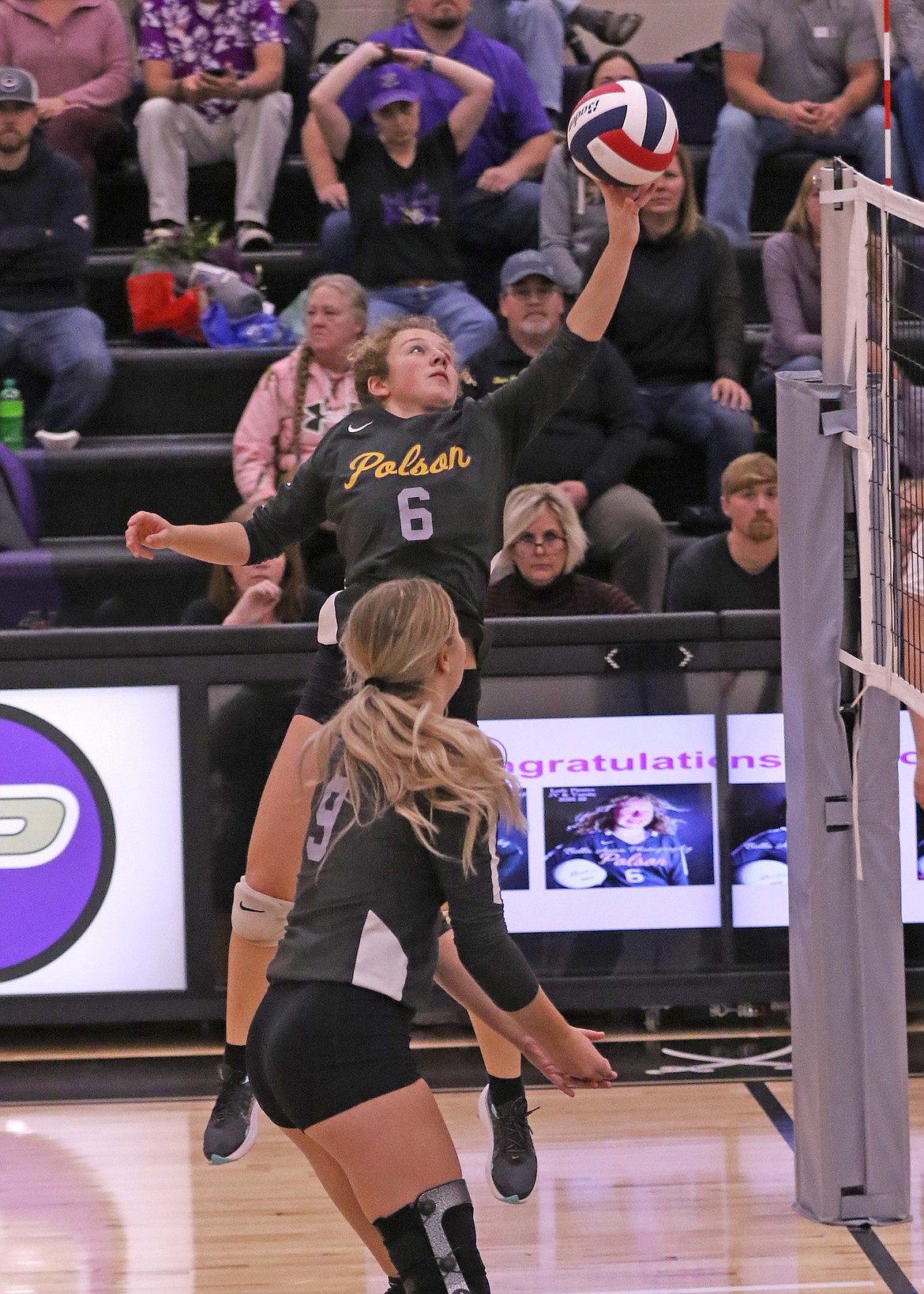 Camilla Foresti hits a shot against Columbia Falls. (Courtesy of Bob Gunderson)